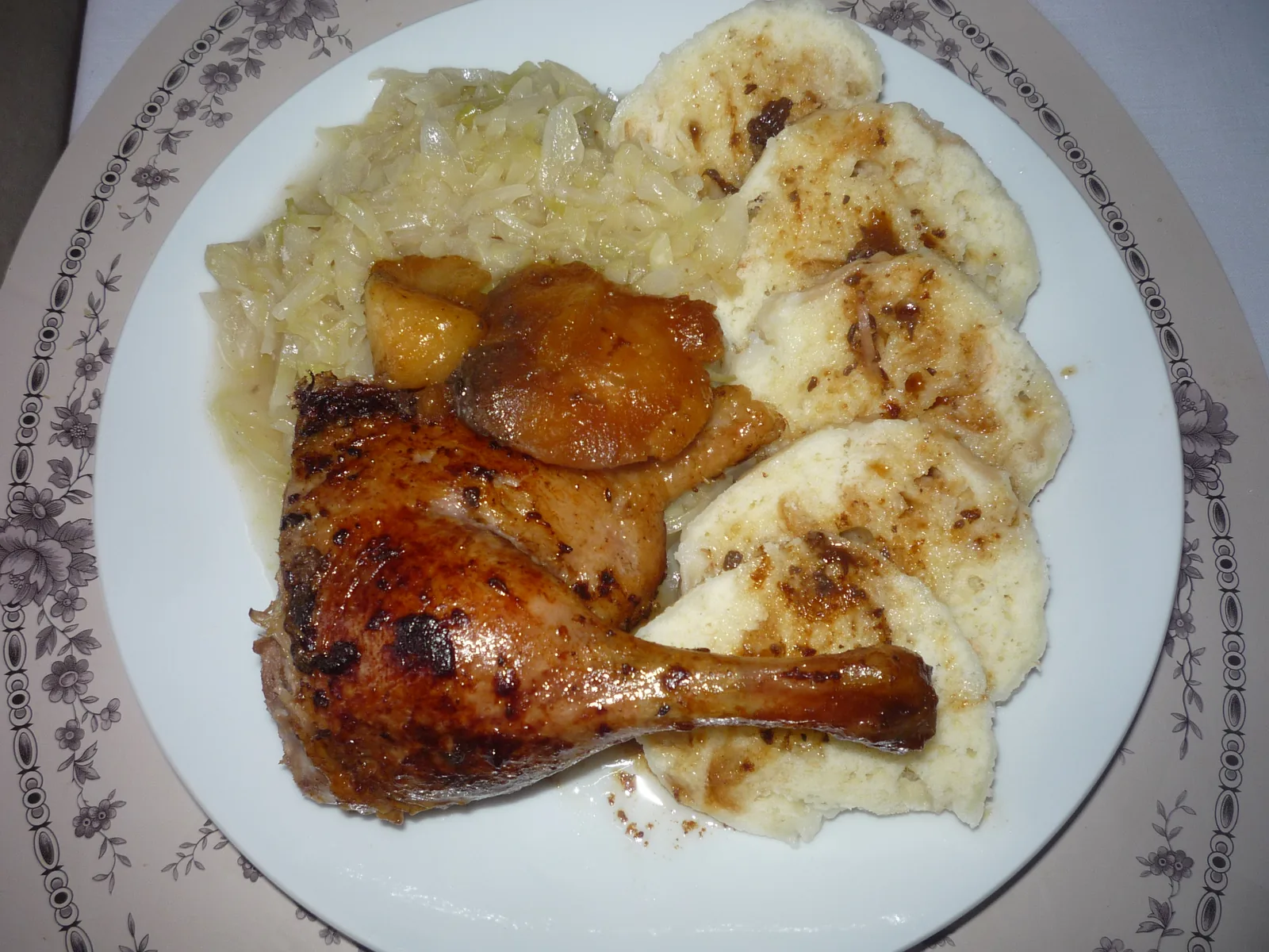 Roast duck with cabbage and dumplings